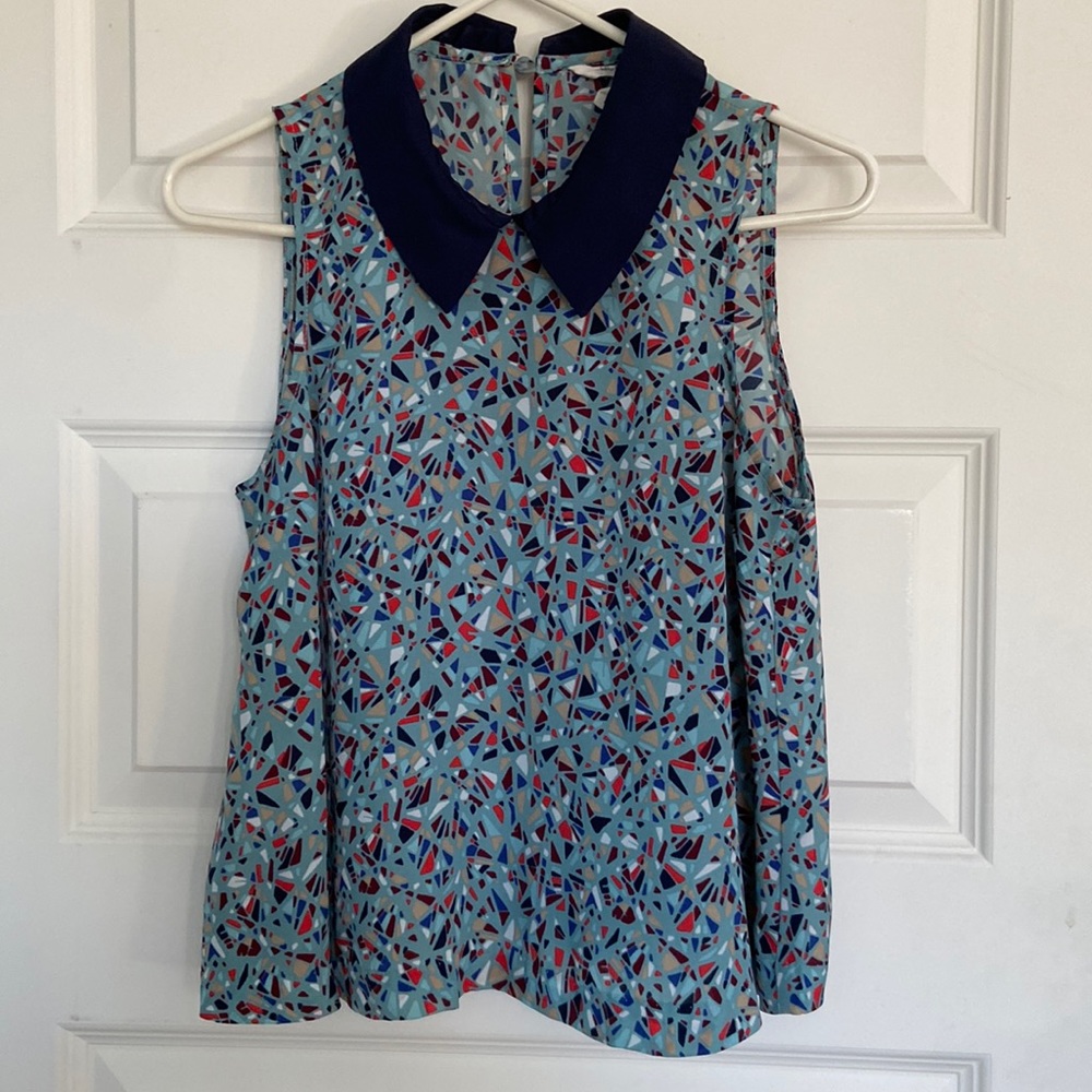 Super cute sleeveless shirt
